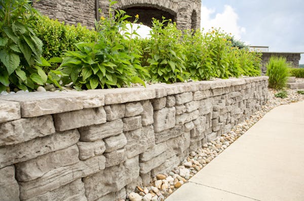 Belvedere retaining wall with lush green landscaping