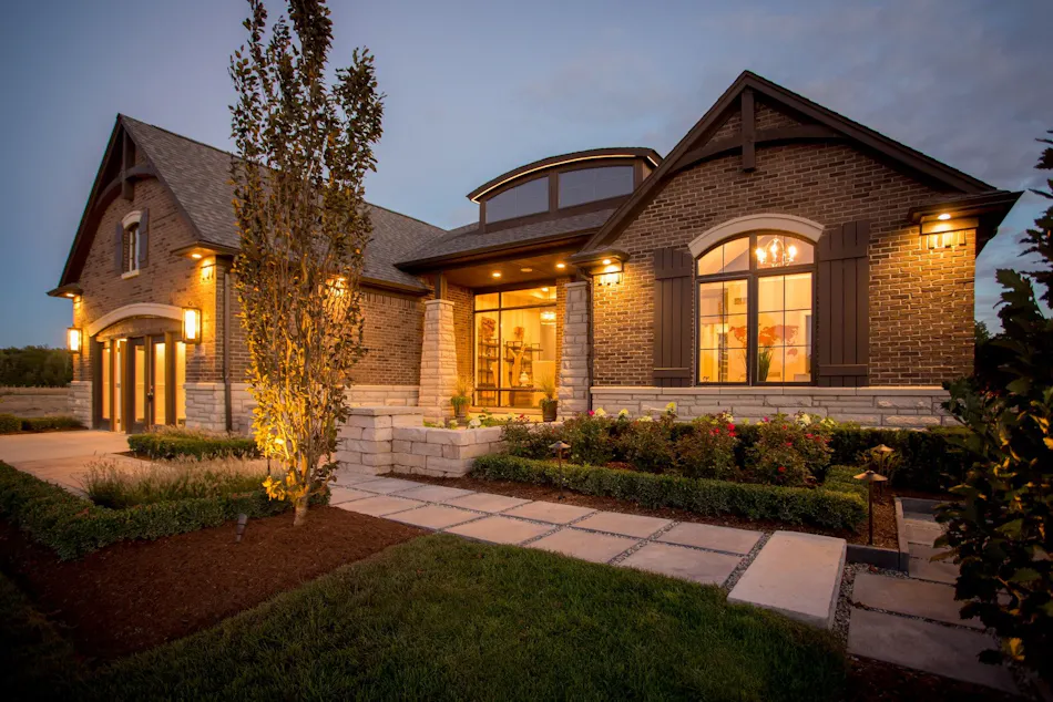 A welcoming hardscaped front entrance