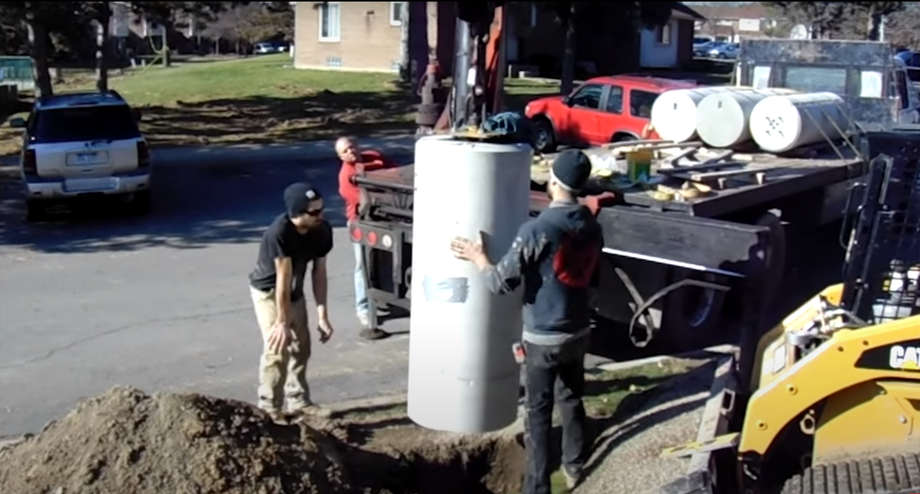 Pole Base boom truck installation of precast light pole bases