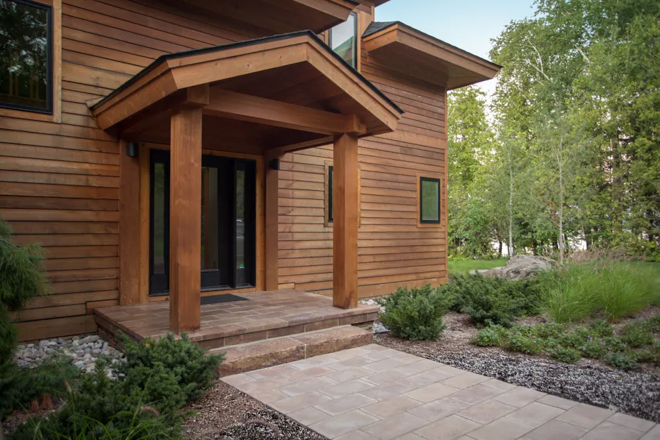 Linear flagstone pathway creates crisp modern entrance