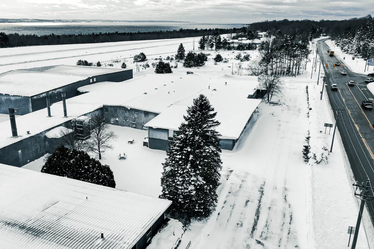 drone shot of building along roadside