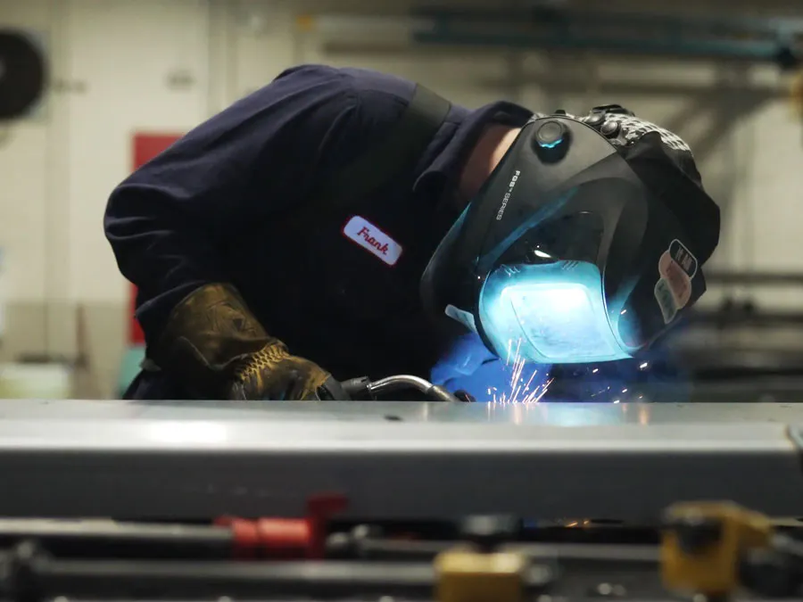 image of person welding steel