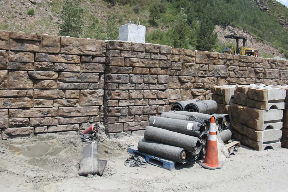 pallet of geogrid next to redi-rock wall