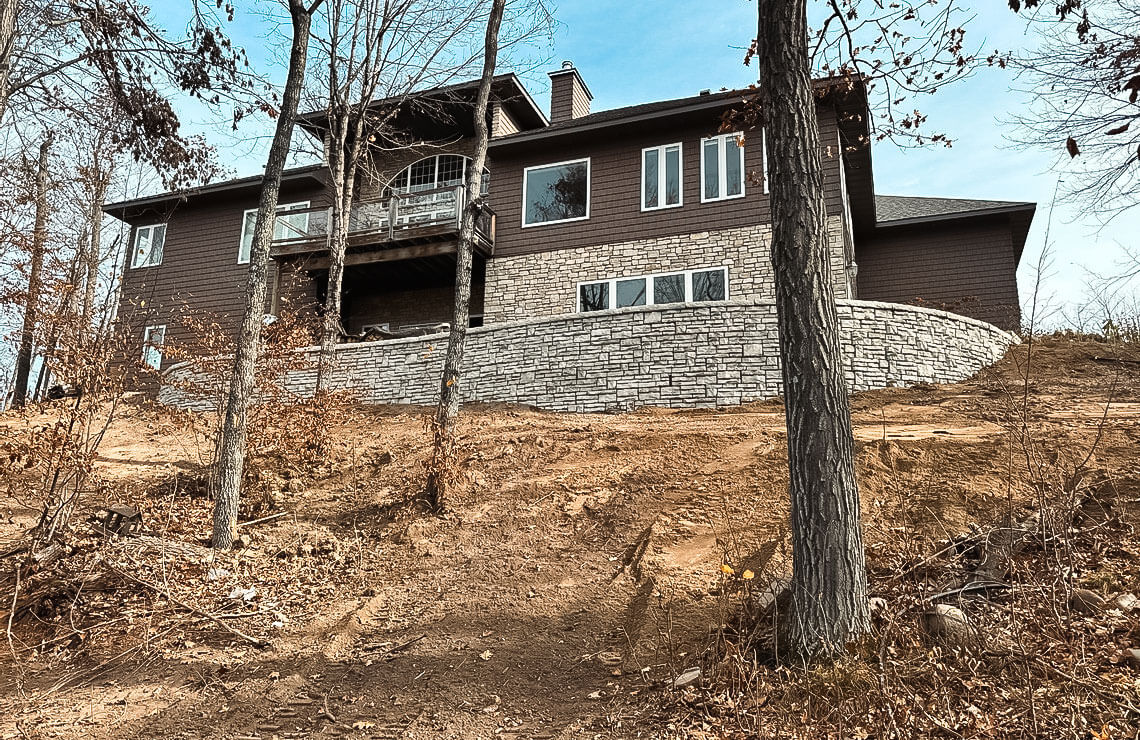 image of stained alpine textured novum wall in for backyard of house