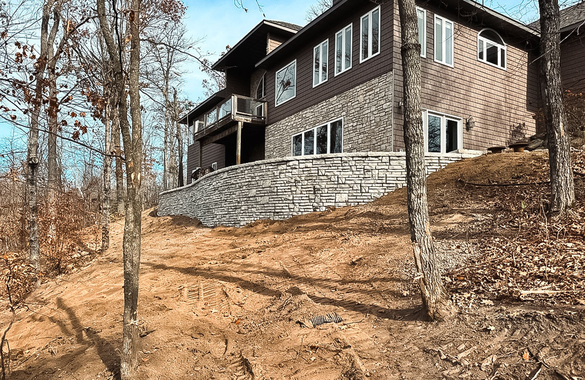 image of stained alpine textured novum wall in for backyard of house