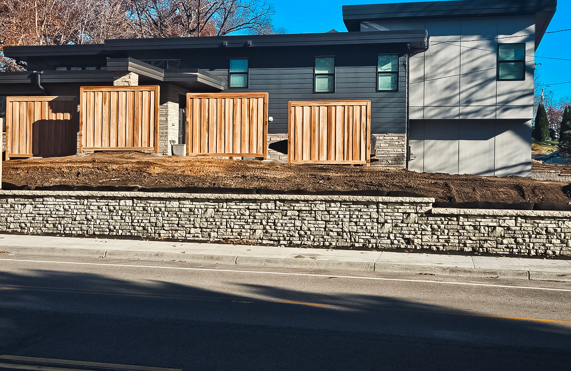 image of alpine textured novum wall along sidewalk