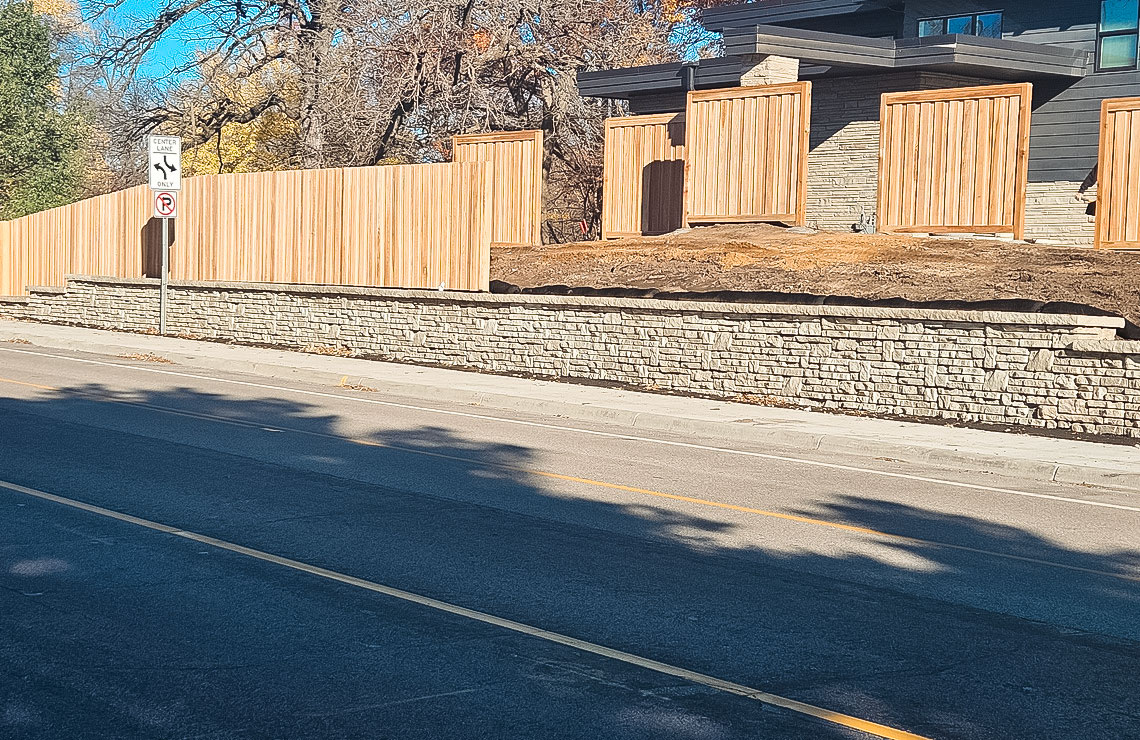 image of alpine textured novum wall along sidewalk