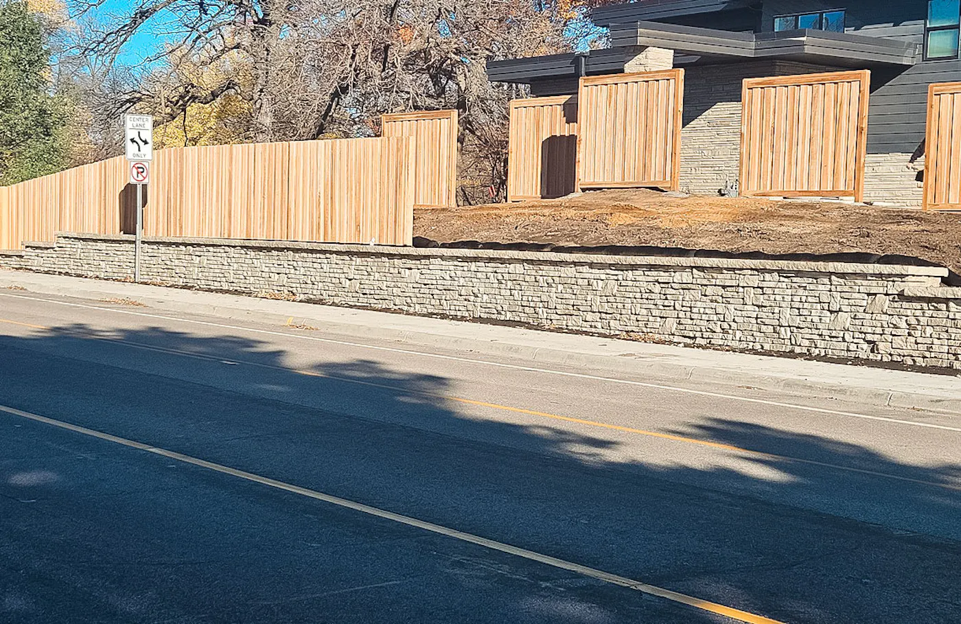 image of alpine textured novum wall along sidewalk