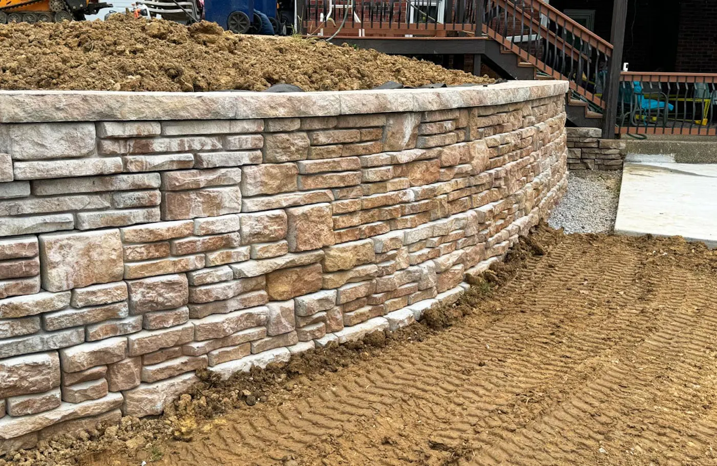 image of close up stained alpine textured novum wall in backyard