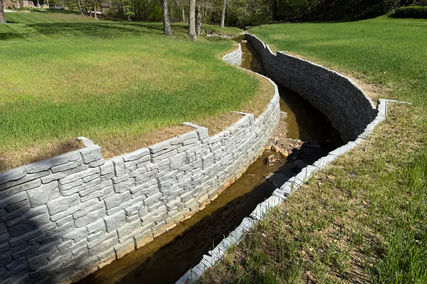 image of two novum walls for stream in alpine texture