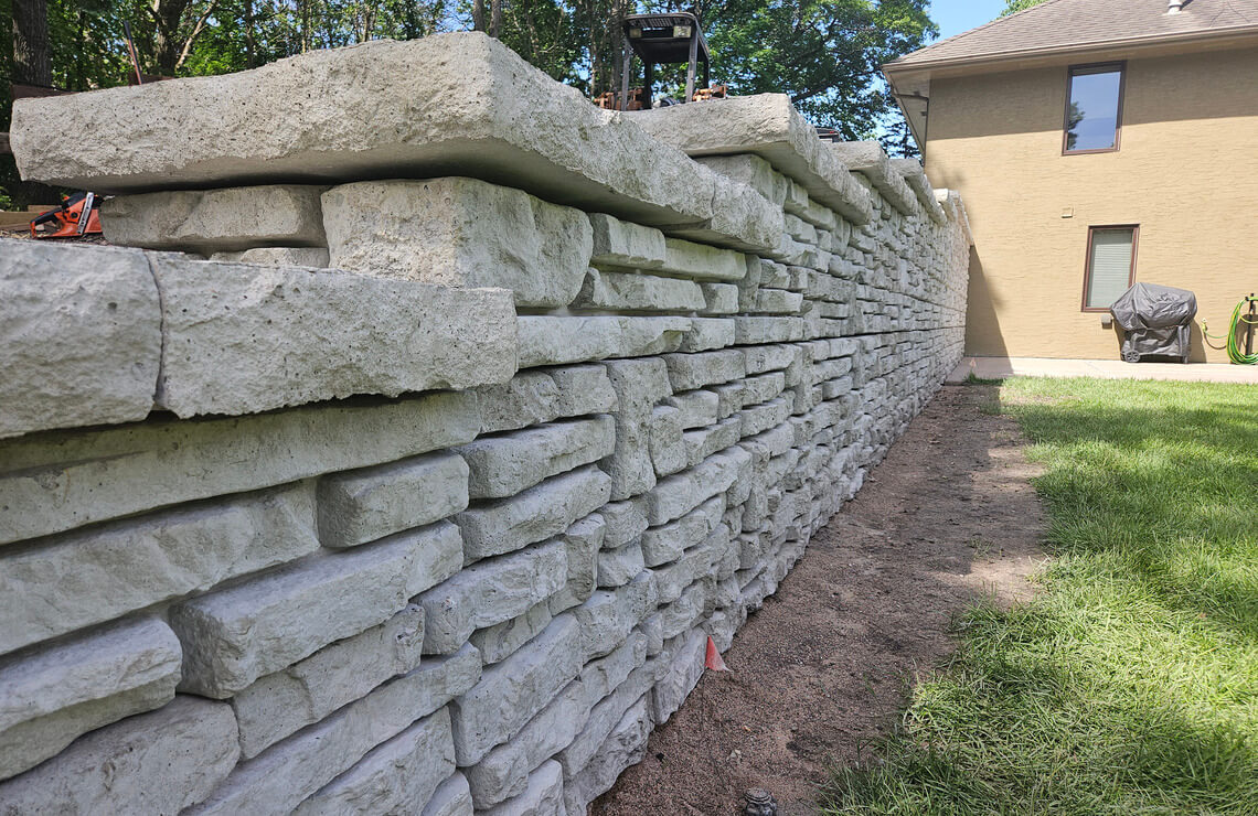 image of close up of alpine textured novum wall next to house