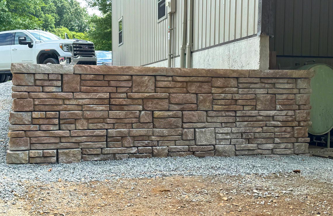 image of stained alpine textured novum wall in front of pole barn