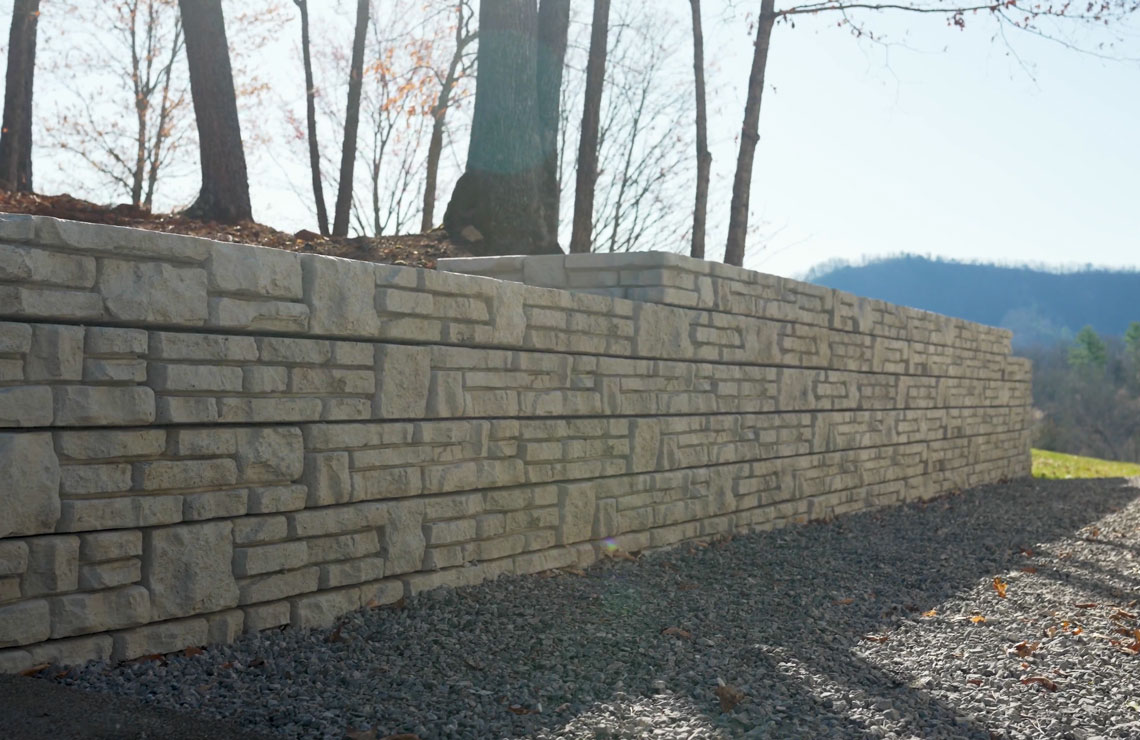 image of alpine novum wall with trees in background