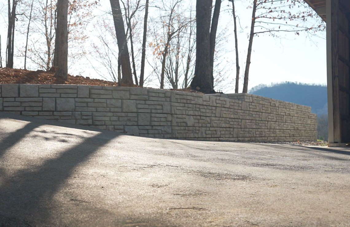 image of alpine novum wall from low view with trees in background