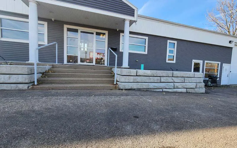 Michigan Insurance Agency Replaces Rotting Timber Wall