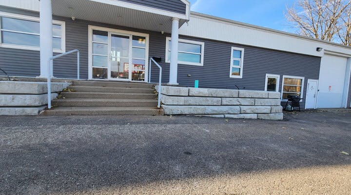 image of front office with novum wall