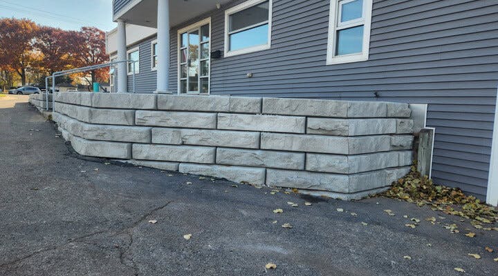 image of front office with novum wall