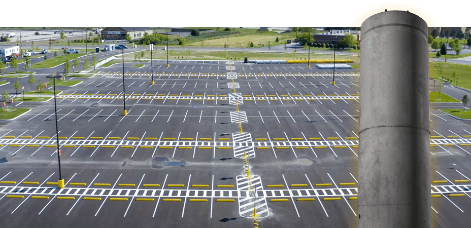 drone view of distribution center parking lot with pole base site lighting