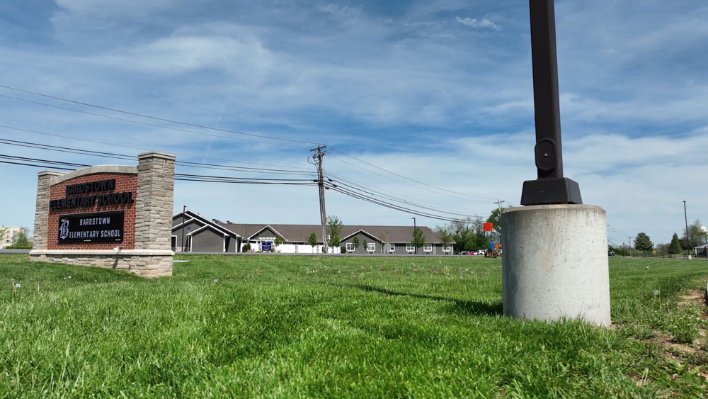 image of Pole Base light pole base next to elementary school sign