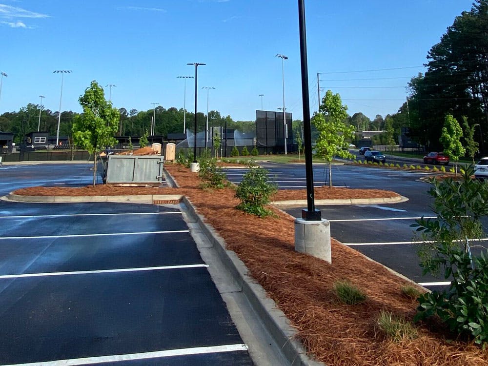 image of pole base light pole base in a parking lot