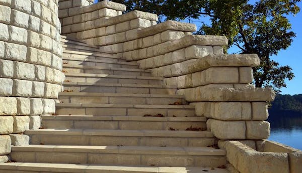 A curving staircase made from Redi-Rock products