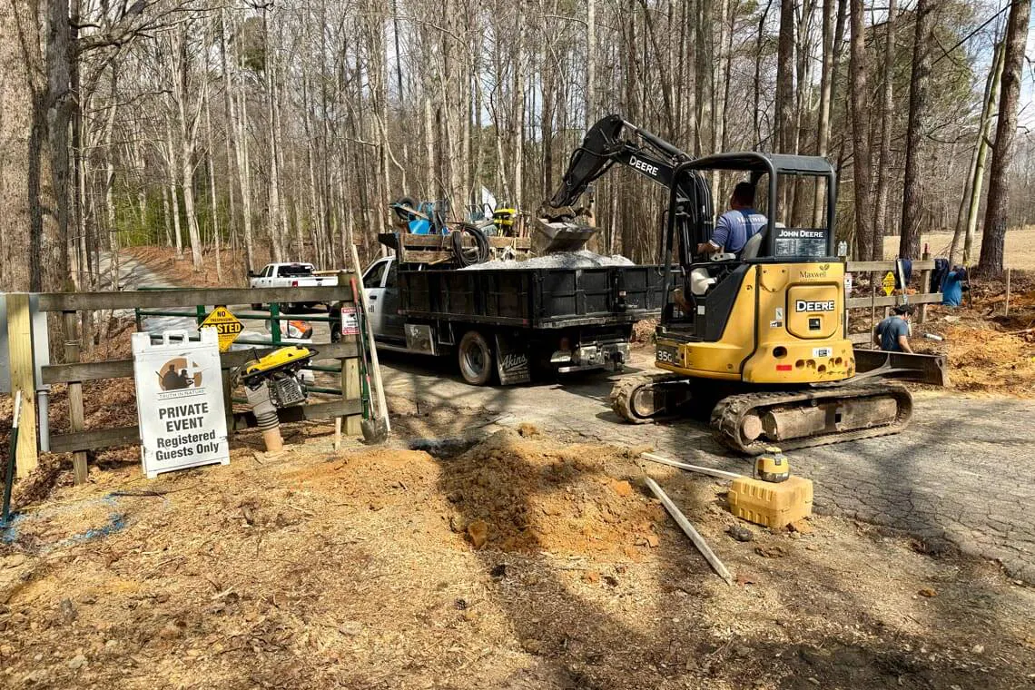 Demolition begins on a Redi-Rock front entryway project.