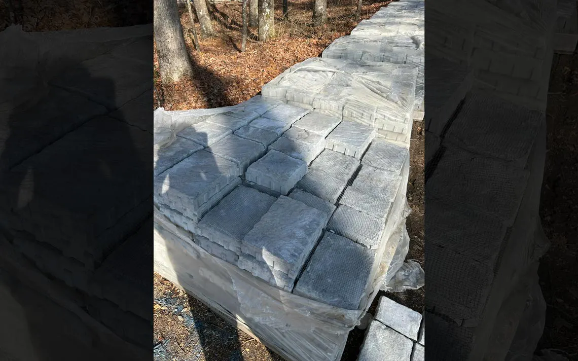 Rosetta Hardscapes Old Mission Pavers on a pallet, staged and ready for installation.