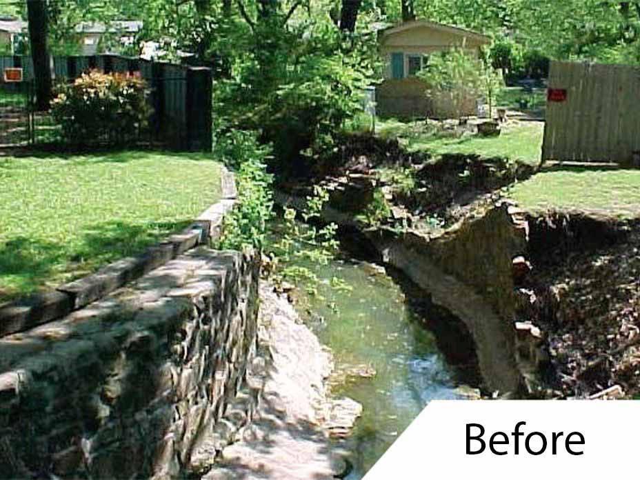 Preconstruction photo of damaged channel retaining wall in neighborhood