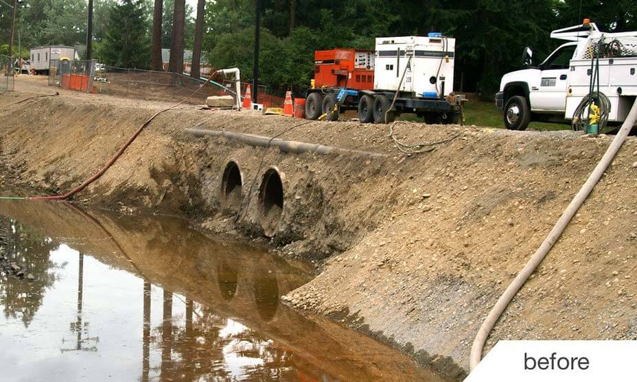 Before photos on roadway being installed across lake