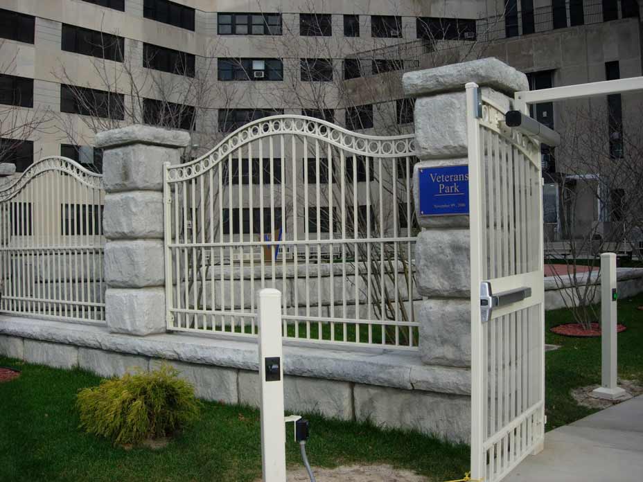 Gated retaining wall entryway to the Veterans Memorial park