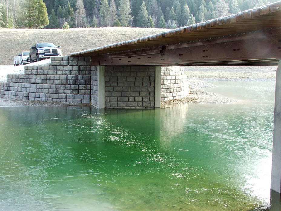 View from below wood bridge using Redi-Rock fin walls