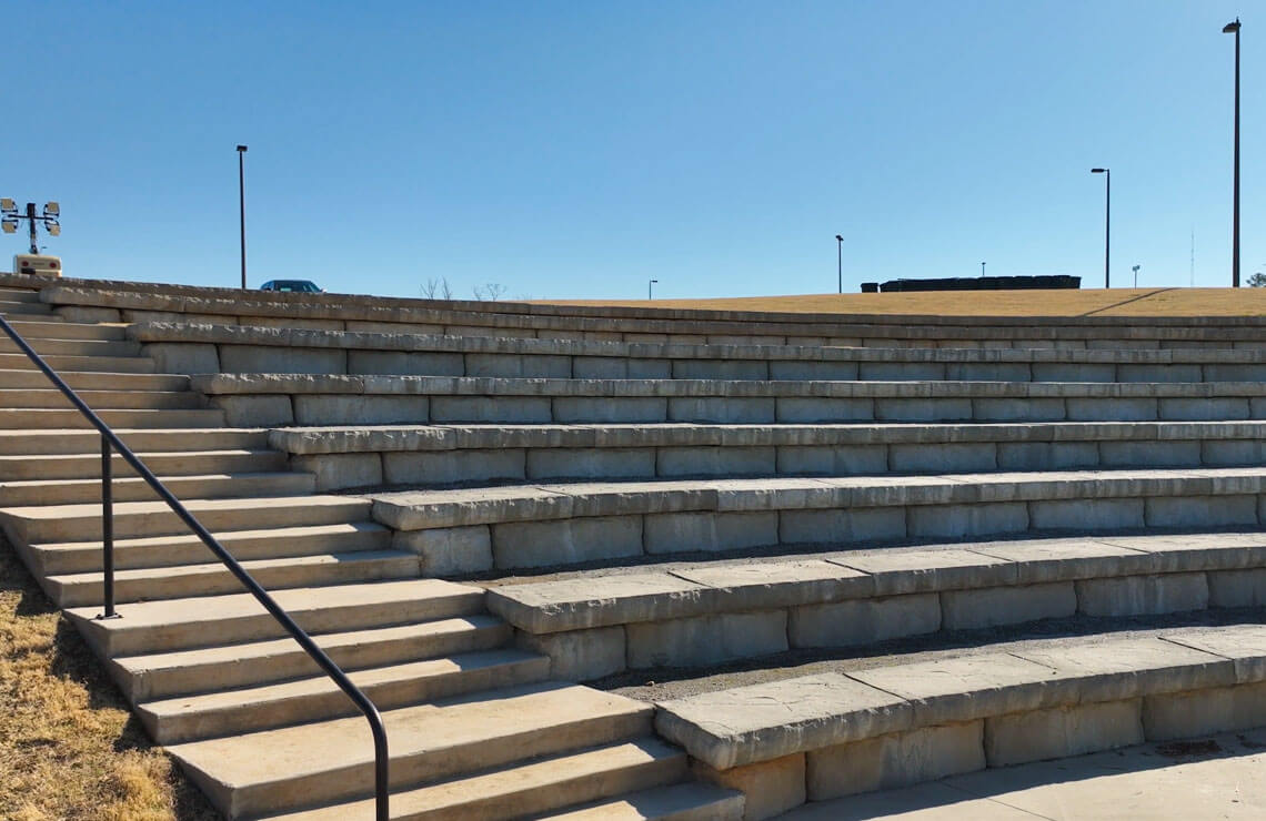 image of amphitheater of redi-rock blocks and caps with stairway