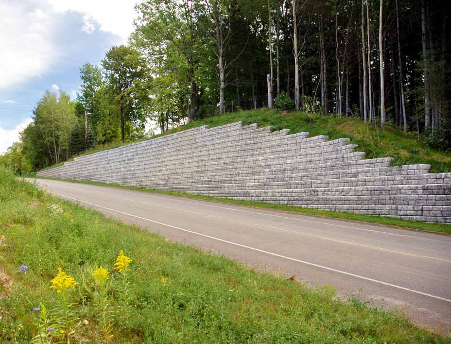 Cobblestone retaining wall along roadway