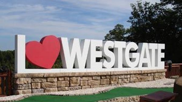 Sign atop Ledgestone freestanding wall that says "I Love Westgate"