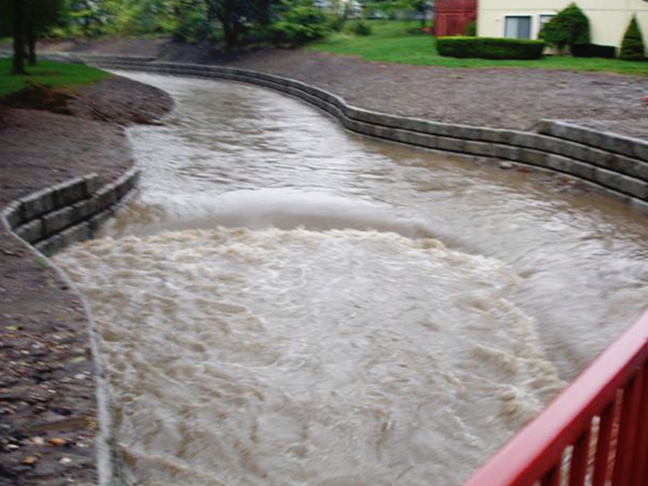 Erosion control in action as water flows through channel