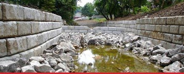 Limestone retaining wall storm water channel