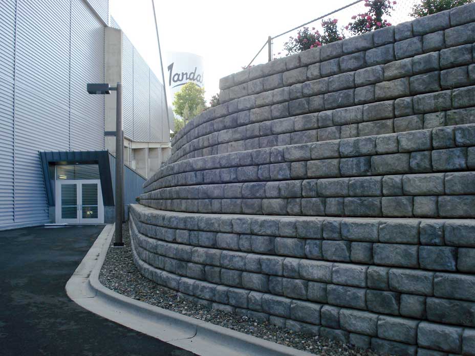 Tiered, curved Cobblestone retaining walls for campus