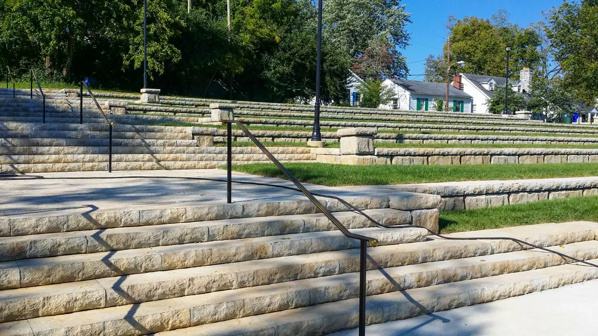 Redi-Rock blocks, steps, and cap solutions create amphitheater seating and retaining walls. 