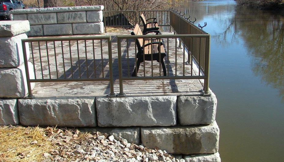Limestone block walls give aesthetic look to fishing pier
