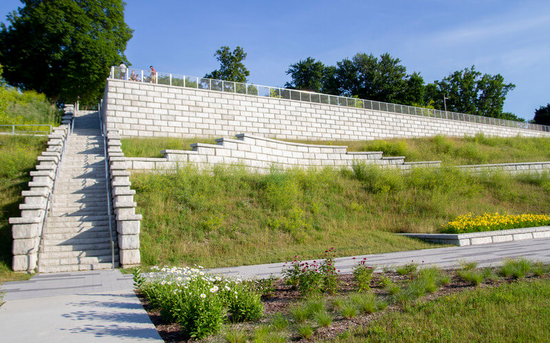 image of redi-rock limestone wall for riverside park with stairway