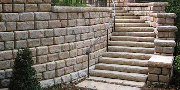 Cobblestone wall with Redi-Rock steps