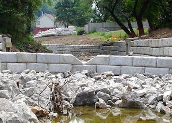 Channel Walls Slow Water to Protect Neighborhood