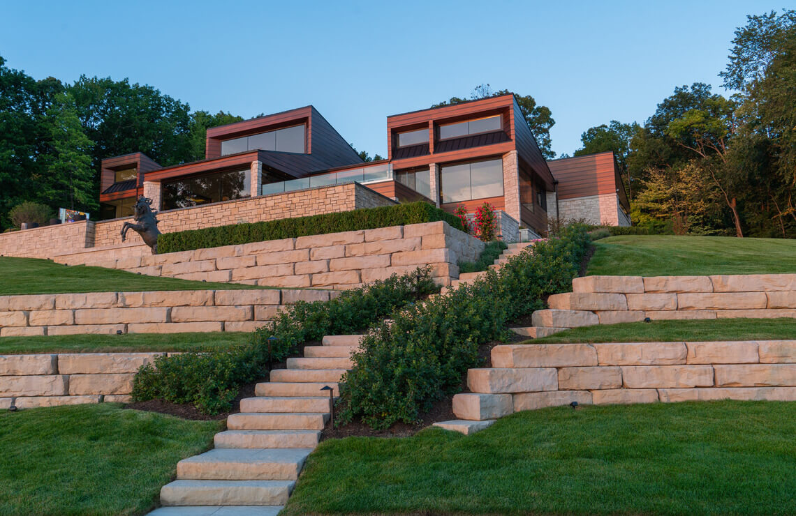 tiered grand ledge walls for residential home with stairway