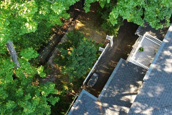 image of aerial overheard of homes backyard (before)