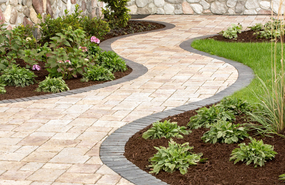 new mission pavers for walkway surrounded by plants