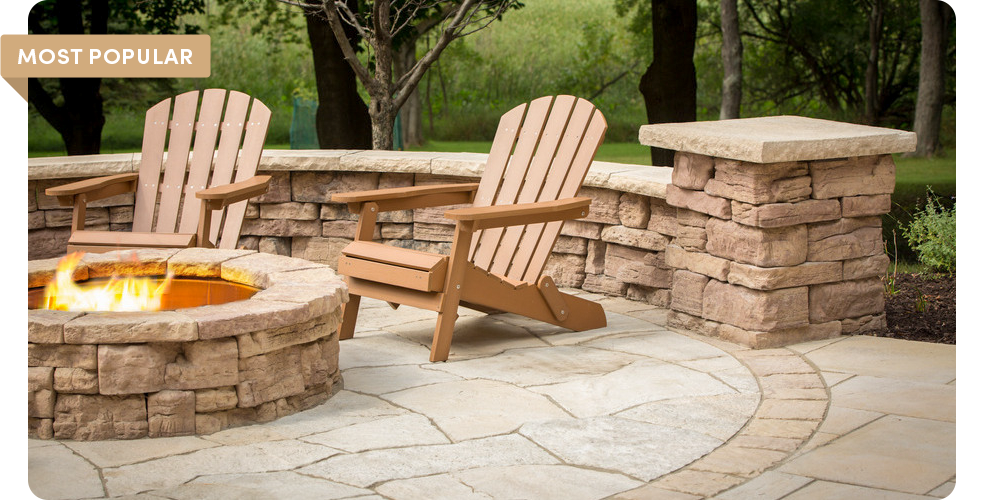 lounge chairs surrounding belvedere fire pit with belvedere wall and column in background with dimensional cap and coping