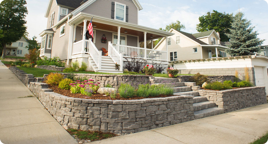 curbside sidewalk with house and belvedere wall