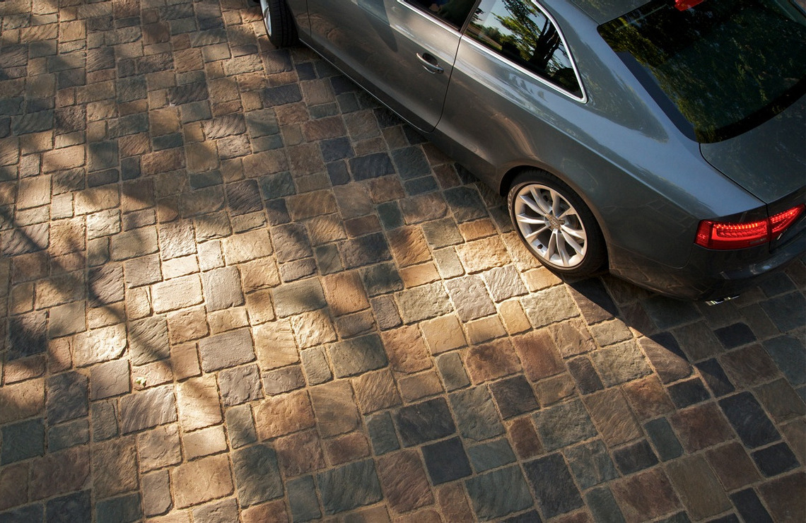 old mission pavers with car