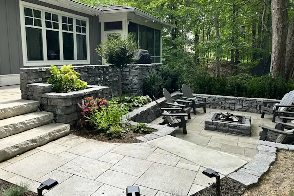 image of backyard patio area with fire pit (after)