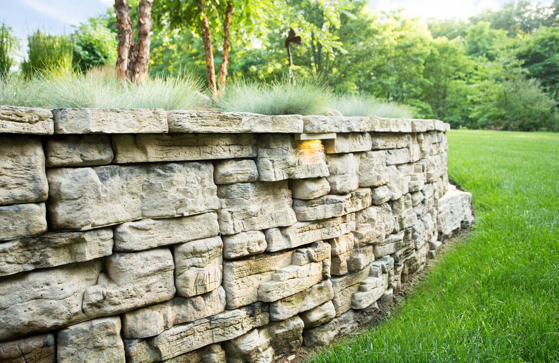 close up belvedere garden wall with belvedere coping and lights